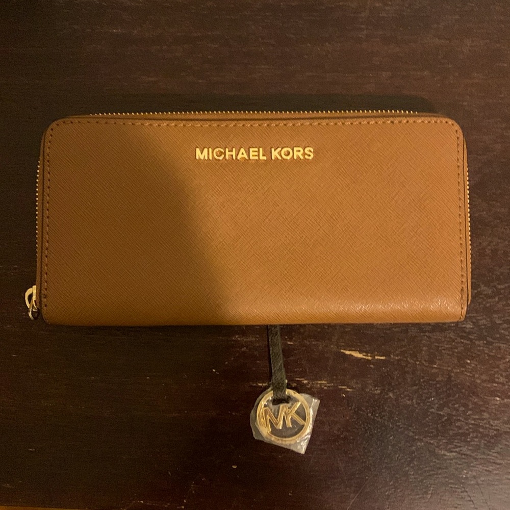 Brand new Michael Kors hand clutch